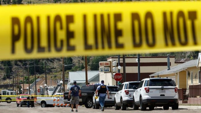 Manhunt under way after four shot dead in Montana bar - Australian ...